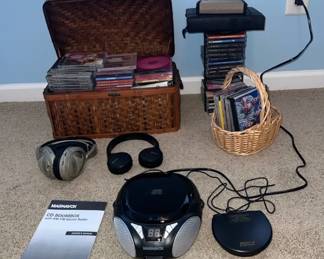 Music CDs, Cases Tower with A Boom Box