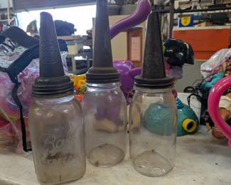 Vintage oil can spouts on Mason jars