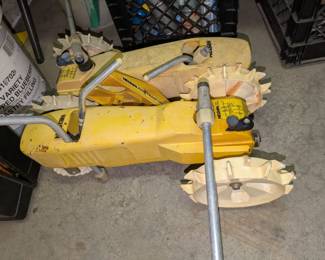 Traveling tractor lawn sprinklers