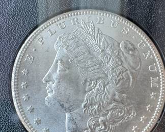 1882 Carson City Morgan silver dollar, in orignal holder, serialized. mint state