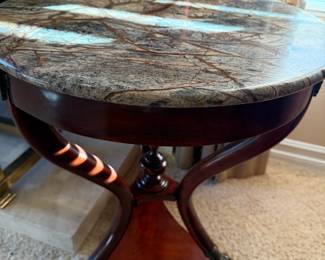 Love this marble topped claw footed side table