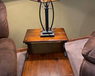 Tiered heavy wood table with table lamp