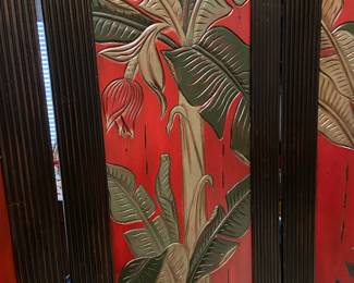 Close-up of the three panel wooden painted room screen