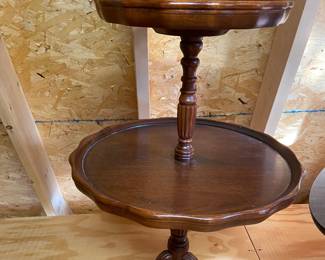 Mahogany double-tiered tri-pod table with brass feet