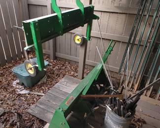 John Deere front-mounted dethatcher 
John Deere tow behind aerator