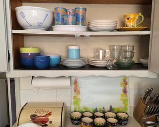 lot's of houseware, bowls, plates, cups, coffee mugs
