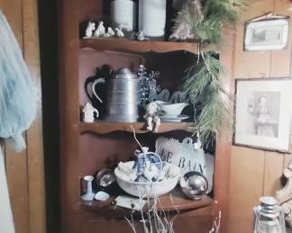 candles, silver pitcher, corner unit
