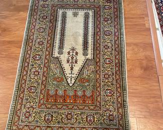 One of the beautiful prayer rugs, handmade