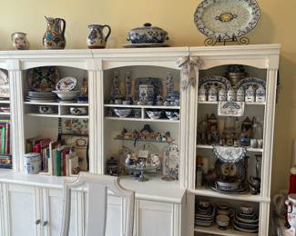 This amazing white wood storage and display cabinet is in separate sections . Will be sold per section or if you like , all sections for discount .