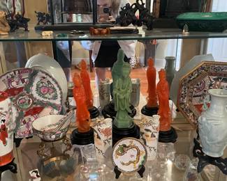 There are a lot of unusual Asian items, including sculptures, neske, and others