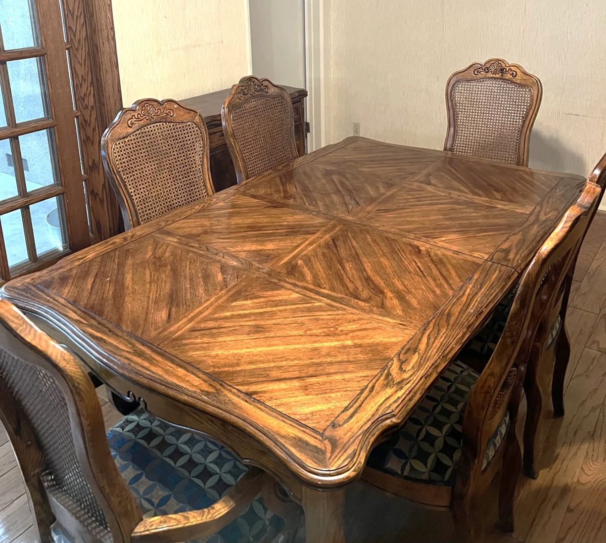 This is the dining table that would really bring some class to your dining room. Note also the two leaves, and the six matching chairs.
