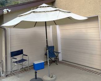 An outdoor umbrella is useful, plus the two outside chairs.