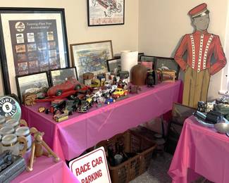 There are other vintage toys and decorations available on the tables in these photos.