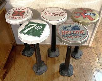These are fairly unusual, a set of five bottle cap barstools. These appear to be set up for a semi-permanent installation.
