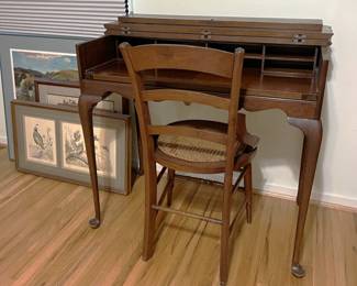 This secretary's desk can fit nicely in a nook in your place.