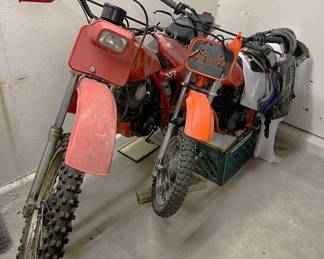 There are two off-road motorcycles in the garage. This is one view....
