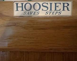 This label applies to the kitchen cabinet in the dining room.