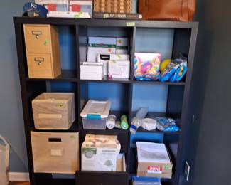 Balloons, Machine to blow up balloons, Copy paper, Envelopes and office cubby.