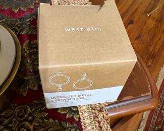 There are at least 8 boxes of these West Elm curtain rings. Figured someone may need some of these. Next picture is a picture of the curtain ring itself.