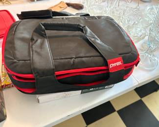 Nice Pyrex casserole with lid and insulated carrier.