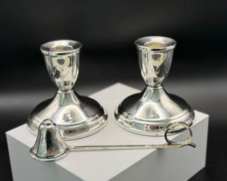 Silver candle stick holders and flame snub