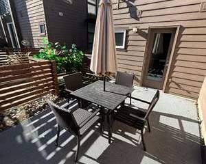 Outdoor Wicker/Metal Patio Dining Set with Umbrella Table and 4 Chairs Weather Resistant