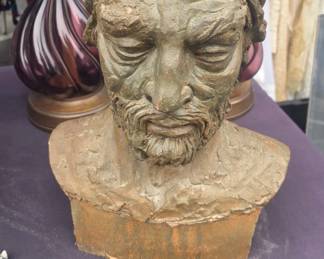 Terra Cotto bust of a man.