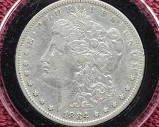 1884-S Morgan Silver Dollar in Airtite, Higher Grade