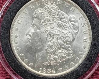 1884-O Morgan Silver Dollar in Airtite, High Grade
