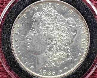 1885-O Morgan Silver Dollar in Airtite, High Grade