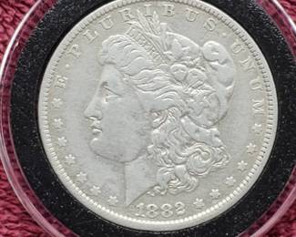 1882-O Moregan Silver Dollar in Airtite