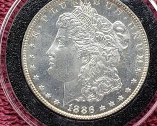 1886 Morgan Silver Dollar in Airtite, High Grade