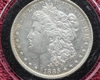 1885 Morgan Silver Dollar in Airtite, Higher Grade