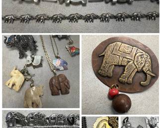 Large collection of elephant in spired jewerly of all kinds, some sterling.  Also a collection of religious items and many rosaries. 