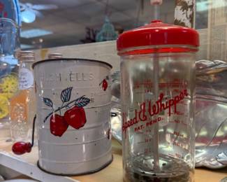 Vintage sifter with apple motif and Speed E. Whipper