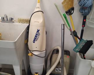 Oreck Rinse-a-Matic steamer and floor cleaner.  Panasonic Jet-Flo 240 vacuum
