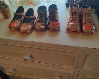 Vintage bronzed children's shoes