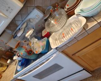 Lots of dishes, including vintage Pyrex