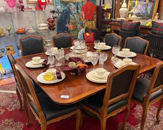 Traditional mahogany dining table with center leaf 8-10 seats (without leaf: height=28” width=53” length=59”) (with leaf: length=81.5”) $225 + tax