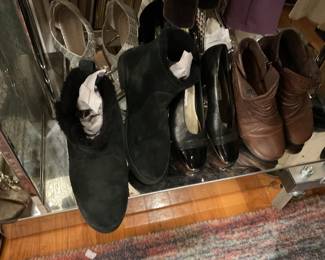 Assorted Leather, suede, and horsehair boots. Salvatore Ferragamo, Coach, Ugg, Clark, Naturalizer