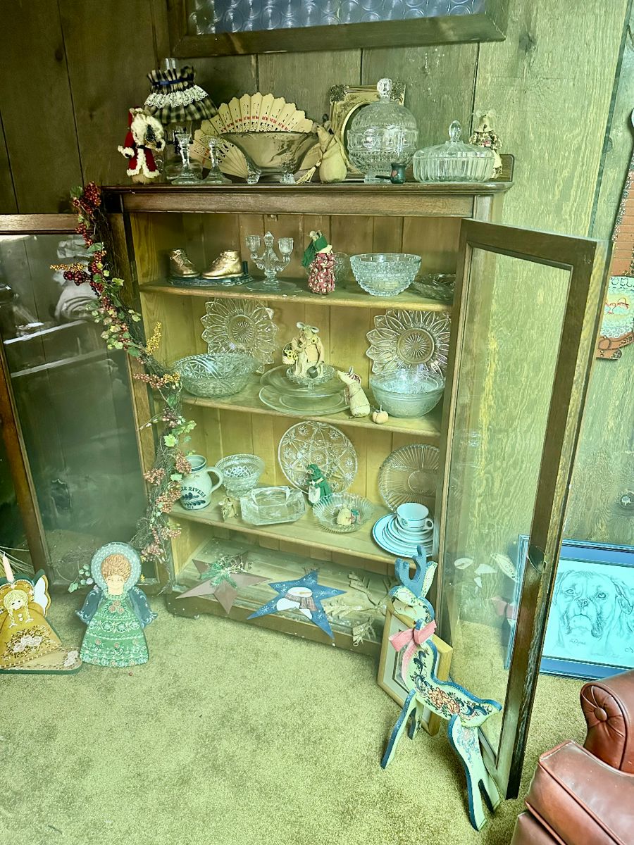 Vintage cabinet with antique serving pieces