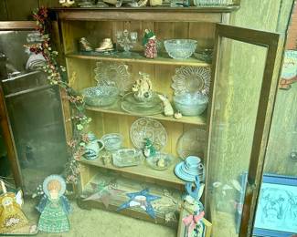 Vintage cabinet with antique serving pieces