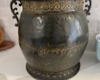 set of three metal vessels