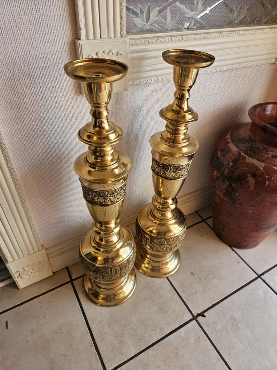 Pair of tall and heavy brass candle holders $60