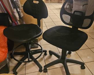 Two rolling desk chairs