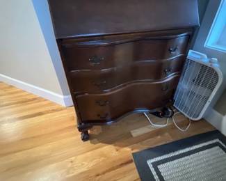 Curved dresser with desk top