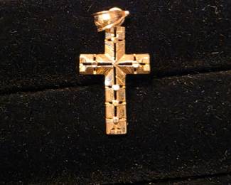 One of several Gold crosses we have in our collection.