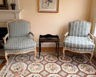 Custom upholstered bergere armchairs.  Needlepoint rug approx 8' x 11'