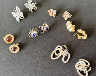 Large array of earrings, mix of pierced and clip-on