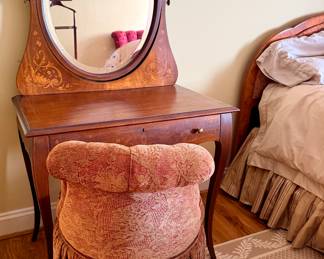 Antique dressing table with oval mirror and vanity chair